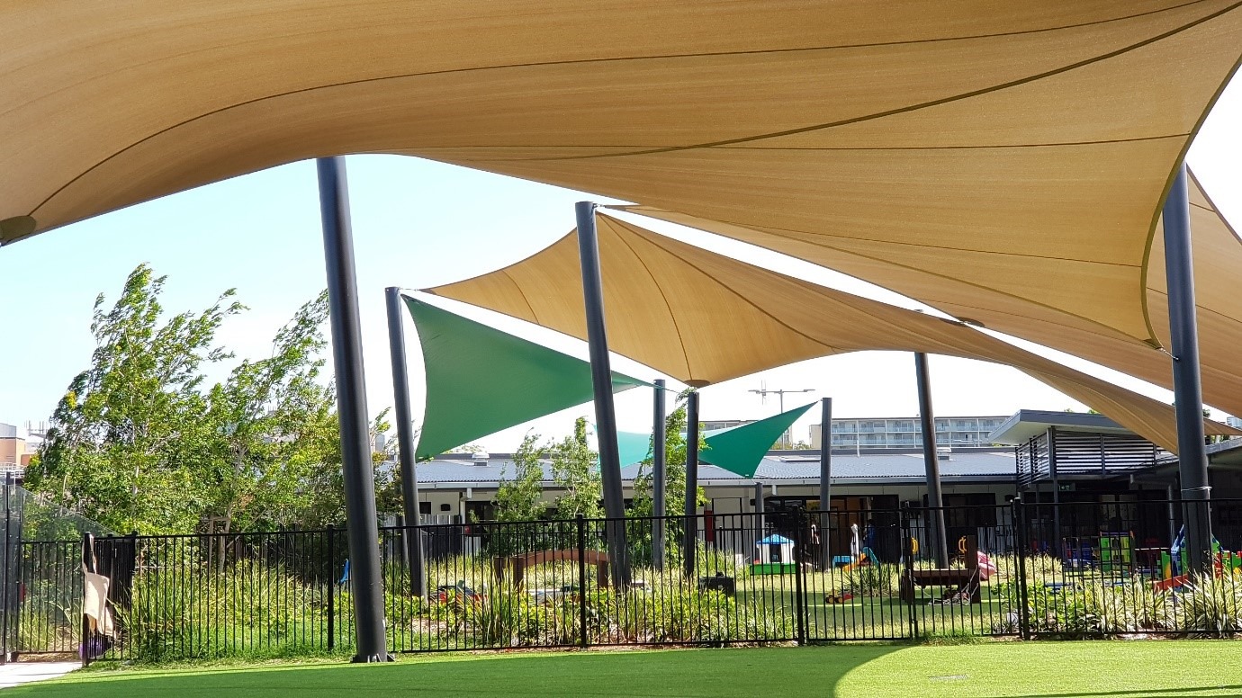 Commercial shade structure installed by Versatile Structures