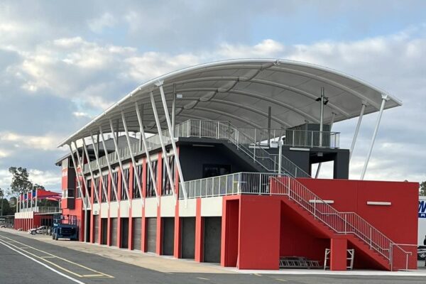 Queensland racetrack waterproof shade structure installed by Versatile Structures Author: Jamie Howard
