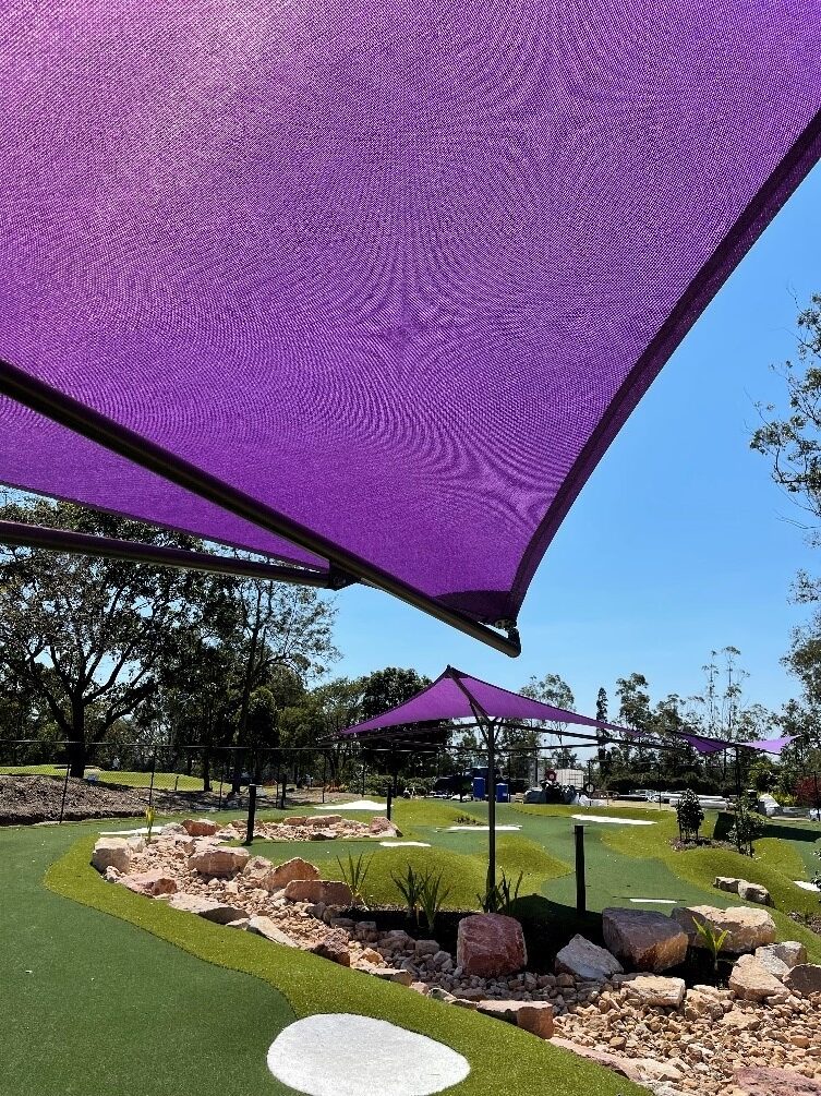 Ozley Mini Golf commercial umbrella installed by Versatile Structures