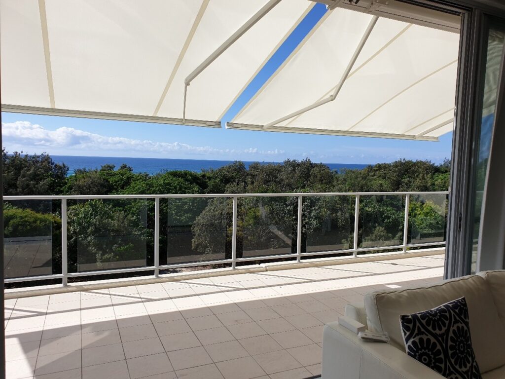 Award winning motorised awning with sun and wind vibration sensor by Versatile Structures